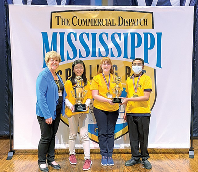 Scripps National Spelling Bee regional partner The Commercial Dispatch with students